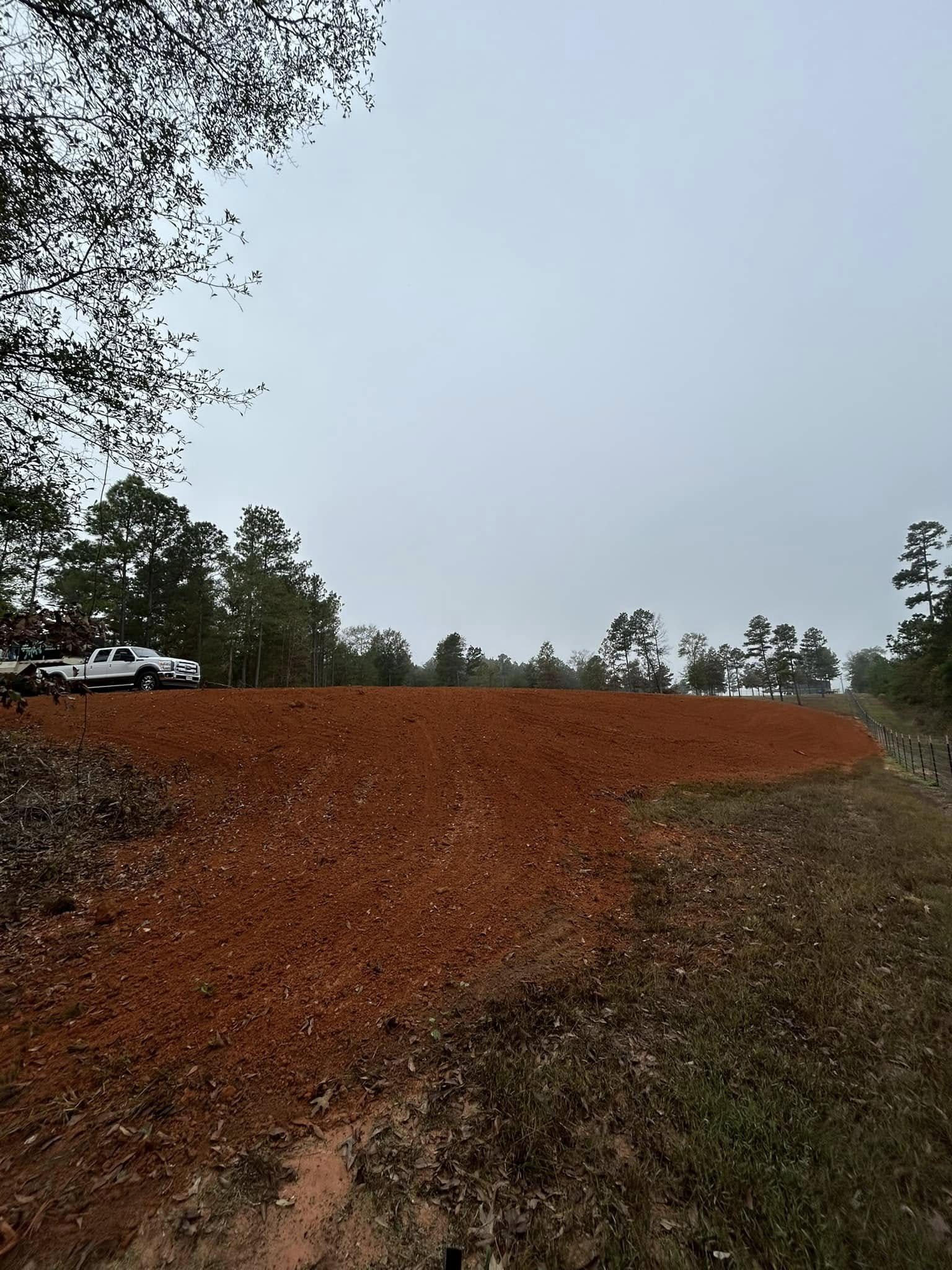 Prep work completed by Seed Tech before hydroseed application on pond dam.